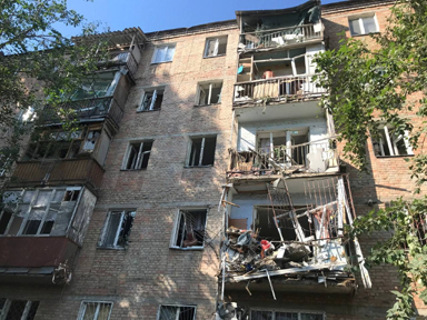 Damaged residential building is seen at the site of the missile strike in Mykolaiv