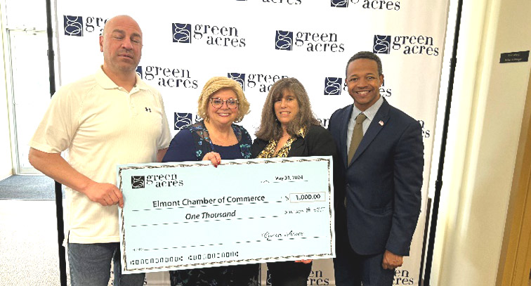 Green Acres Mall officials presented a $1,000 check in support of the Elmont Chamber of Commerce, and a $3,000 check for Simon’s Valley Stream Jazz Festival (Credit: Office of Legislator Carrié Solages)