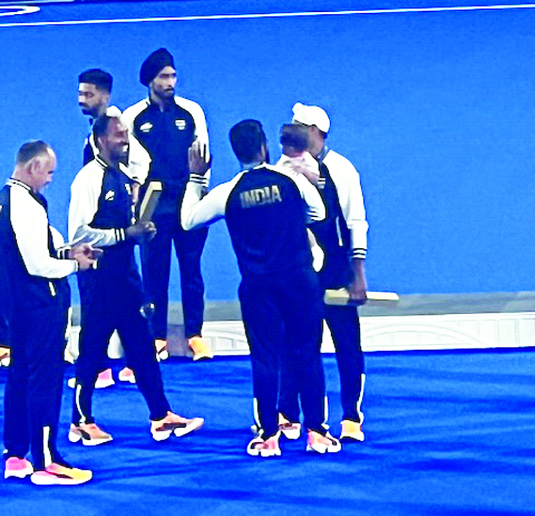 Why did India return from Paris with 16 and not 18 hockey Olympians