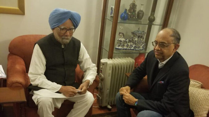 George Abraham with manmohan-singh-delhi-2020