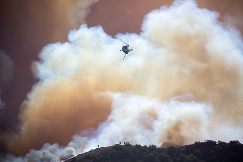 Los Angeles wildfires: Death toll rises to 24, winds may fuel blaze
