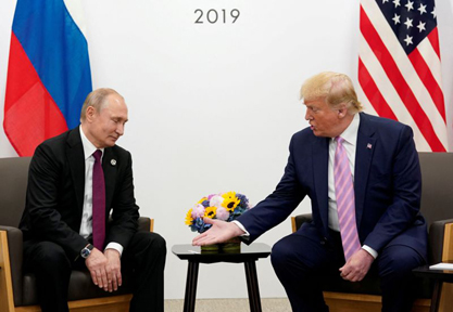 Putin Trump Great powers have witnessed the rise of strongmen such as Putin and Trump. (File photo)